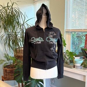 O'Neill Women's Black Zip-Up Hoodie with Floral Graphic Design